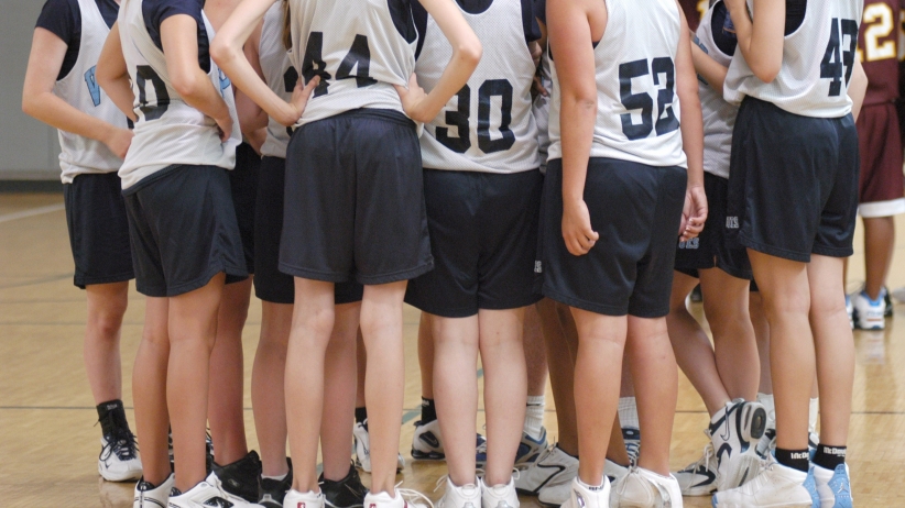 20150427132753-coach-company-team-champions-girls-basketball-huddle